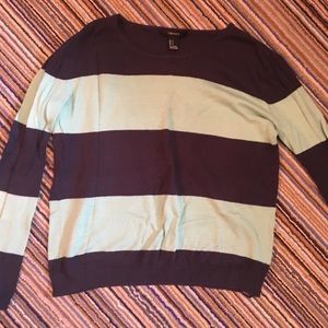 mint and dark blue sweater